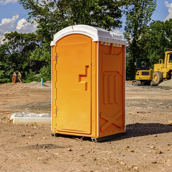 how often are the portable restrooms cleaned and serviced during a rental period in Goulds FL